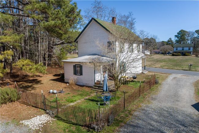 View of side of The Callis Store -property featuring fence and driveway | Image 21