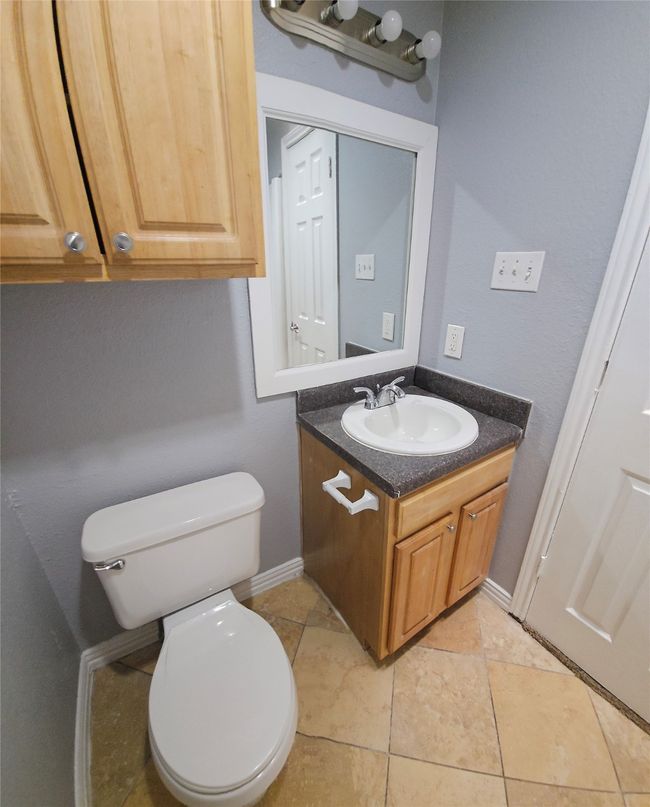 Bathroom with vanity and toilet | Image 13