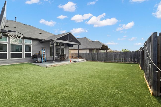 View of yard with a patio | Image 28
