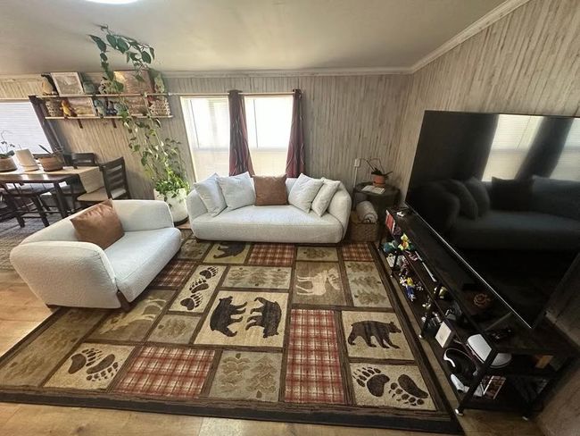 Living room featuring ornamental molding | Image 26