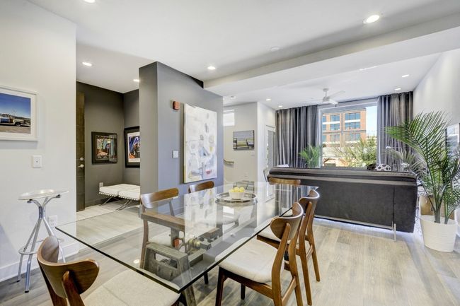 Dining room with light wood-style floors, recessed lighting, and a ceiling fan | Image 8
