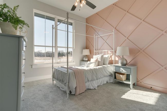 Bedroom with carpet and ceiling fan | Image 22