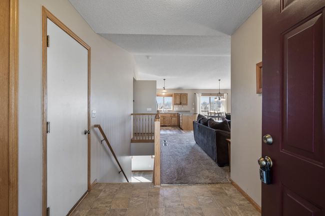 Open foyer welcomes you to the well maintained home! | Image 4