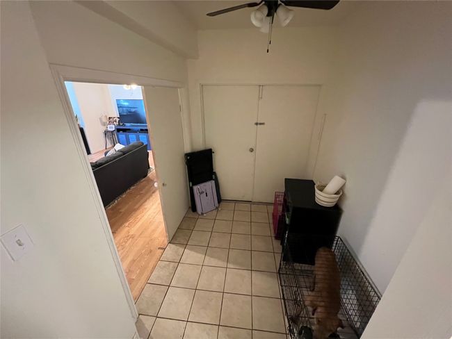 Entryway with ceiling fan and light tile patterned floors | Image 22
