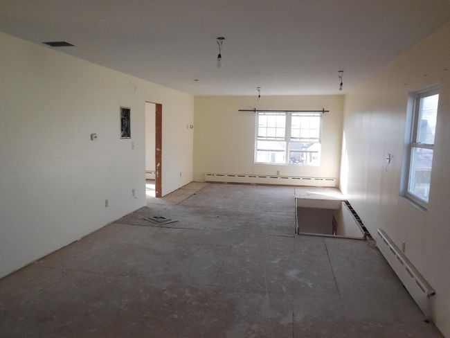 Spare room featuring a baseboard heating unit and baseboard heating | Image 8