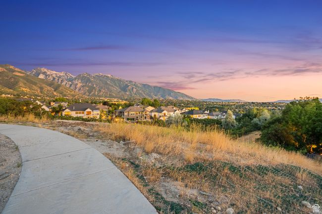 View of mountain backdrop with nearby suburban area | Image 26