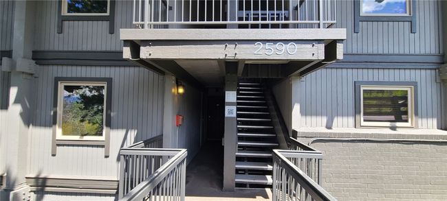 Entrance to property with a balcony | Image 23