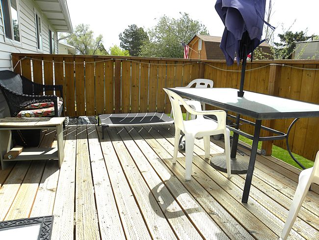 Deck off of kitchen. | Image 33