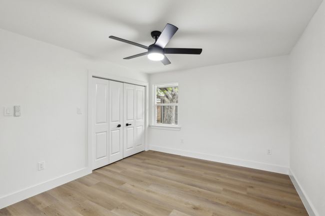 Unfurnished bedroom featuring a closet, baseboards, and light wood finished floors | Image 24