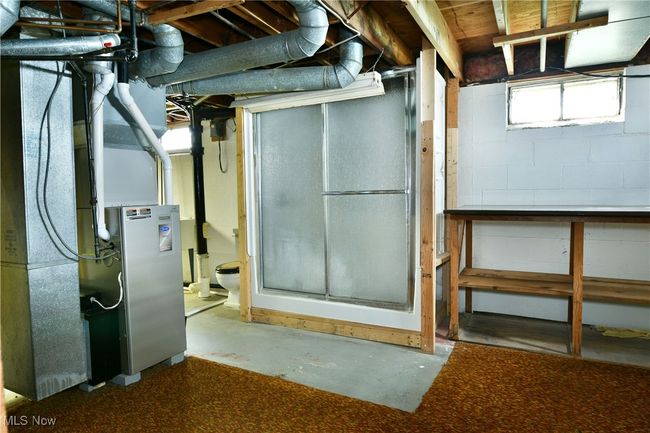 Basement with concrete block wall | Image 40