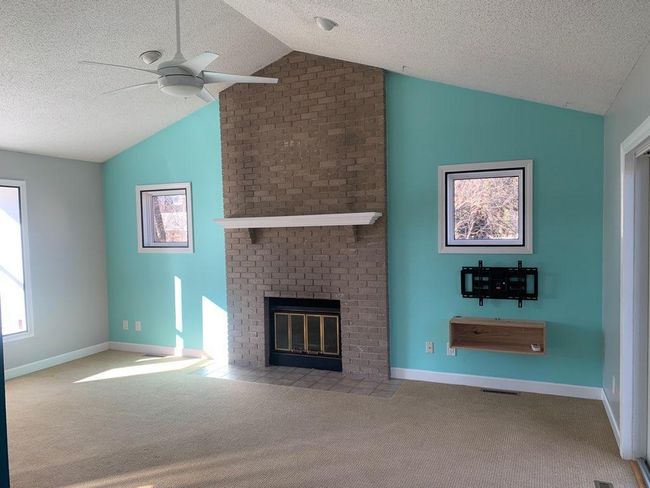 Floor-to-ceiling brick fireplace | Image 8