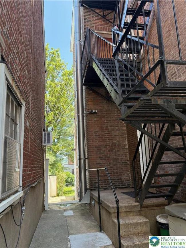 Side yard showing fire escape | Image 34