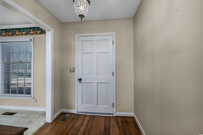 Entryway featuring dark wood-type flooring | Image 10