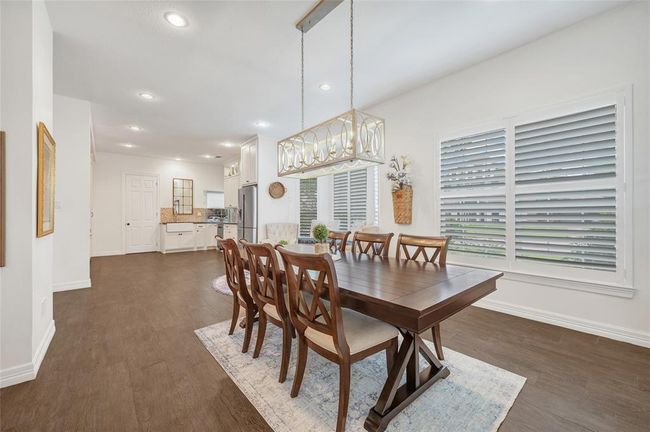 Generously sized breakfast/dining area. | Image 14