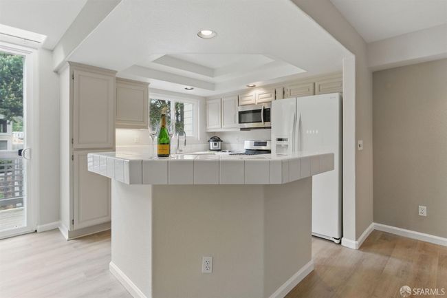 A lovely kitchen island so you can be in the kitchen and still enjoy visiting with guests | Image 17