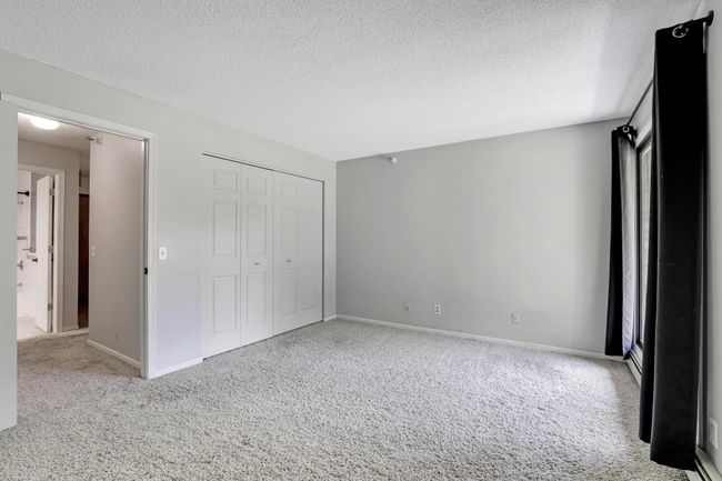 Six panel doors and closet doors throughout. | Image 9