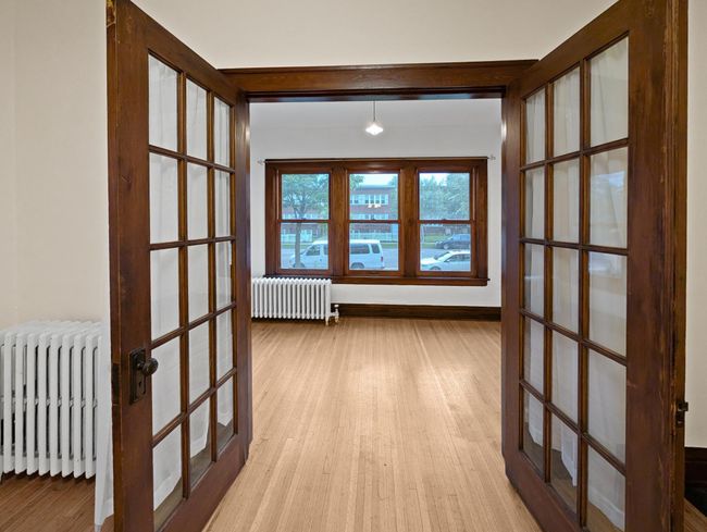 French doors on Sun Room. | Image 4