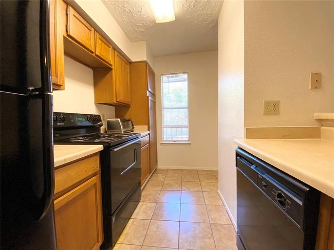 UNIT-903 - 10555 Turtlewood Ct, Townhouse with 2 bedrooms, 2 bathrooms and null parking in Houston TX | Image 12
