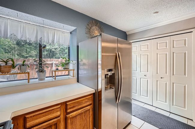 Window overlooks your back patio! So cute! | Image 10