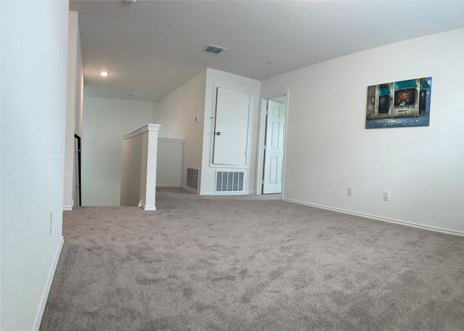 Carpeted Game room with baseboards | Image 17