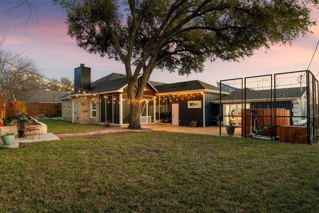 The mature trees in the backyard create a peaceful retreat, providing shade and beauty in every direction | Image 31