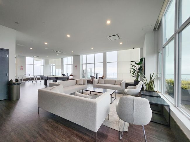 Living room featuring dark wood finished floors and recessed lighting | Image 11