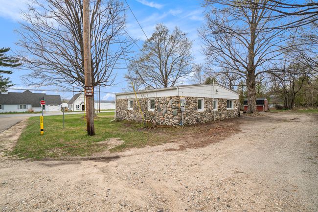 4642 Main St, House other with 8 bedrooms, 5 bathrooms and null parking in Onekama MI | Image 56