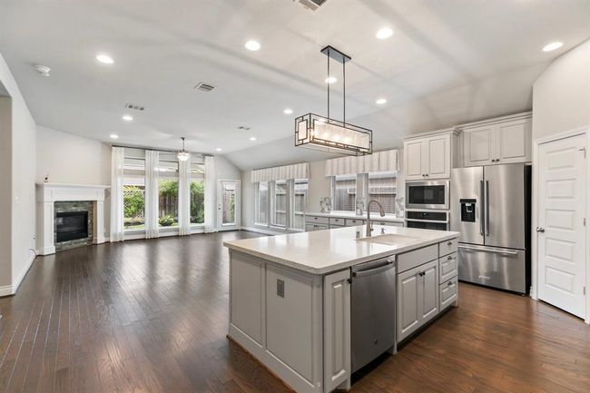 Kitchen and Living Area are Completely Open to Each Other. | Image 7