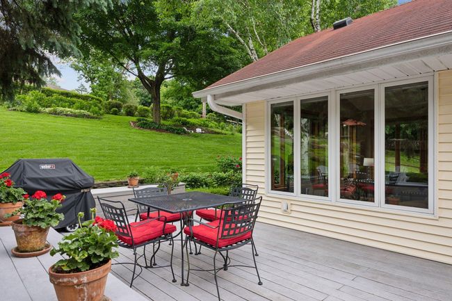 Enjoy the outdoors while dining al fresco on the private deck | Image 37