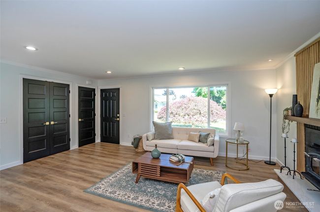 Beautiful doors with fine brass finishes complement the home. | Image 5