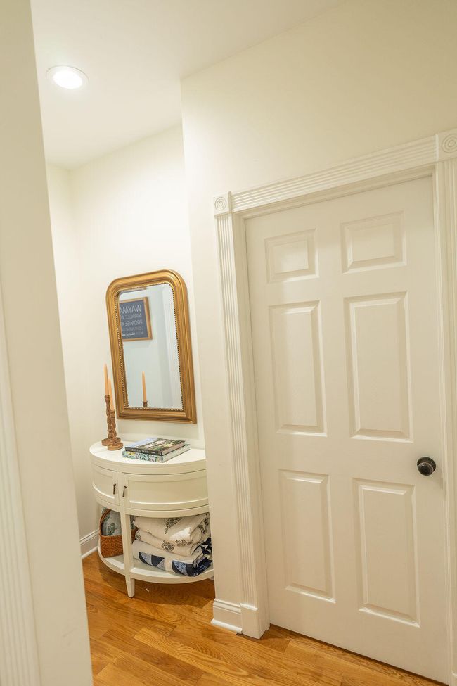 Hall leading to primary (master) bedroom. | Image 41