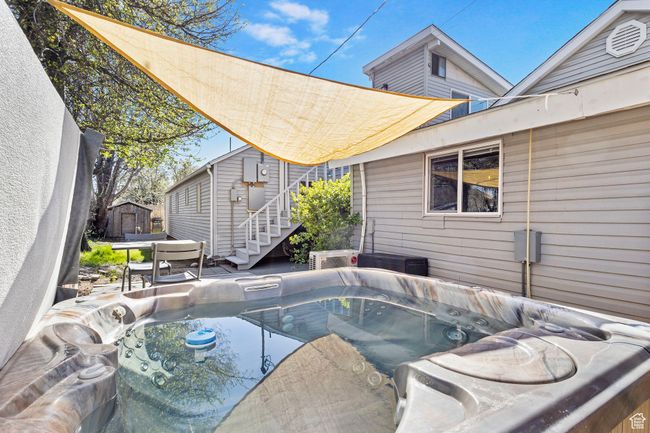 View of patio featuring a hot tub | Image 47