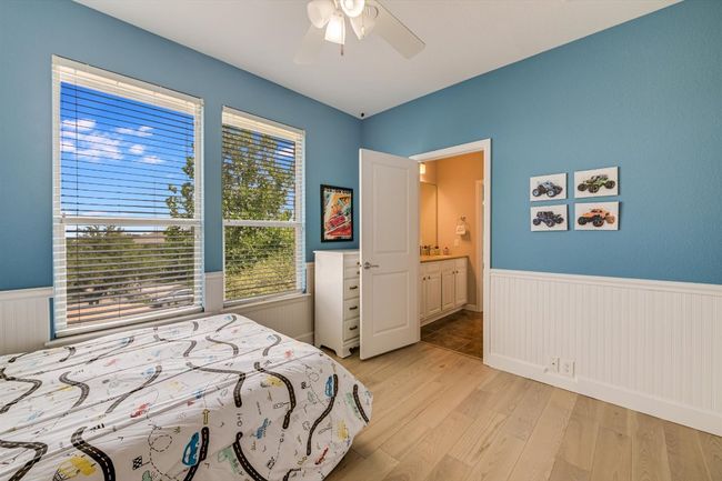 Extra bedroom 1 connected to a shared bath. | Image 21