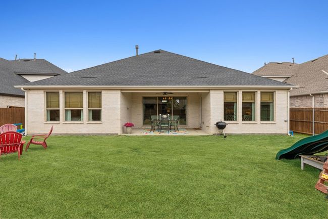 Nice size backyard and large covered patio to watch the sun rise | Image 32