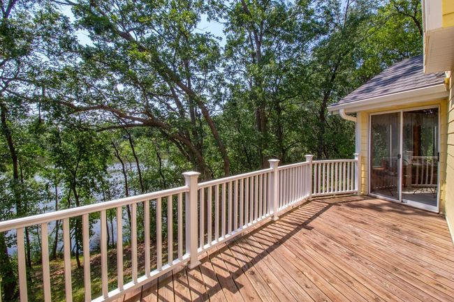 In this reverse view you can see the sliding door that leads into the three season porch. | Image 37