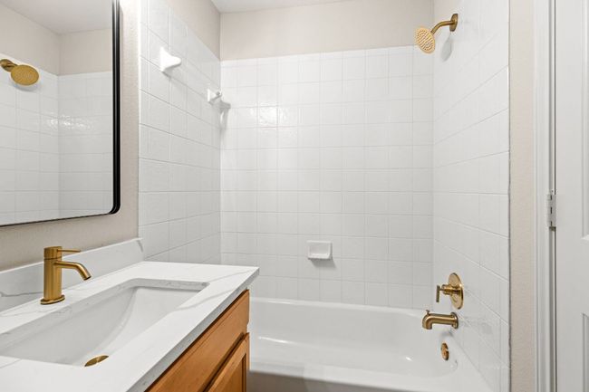 Bathroom with bathing tub / shower combination and vanity | Image 26
