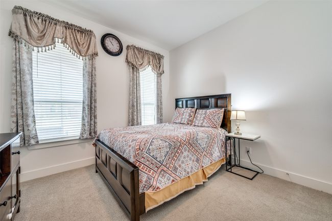 Bedroom with carpet | Image 16