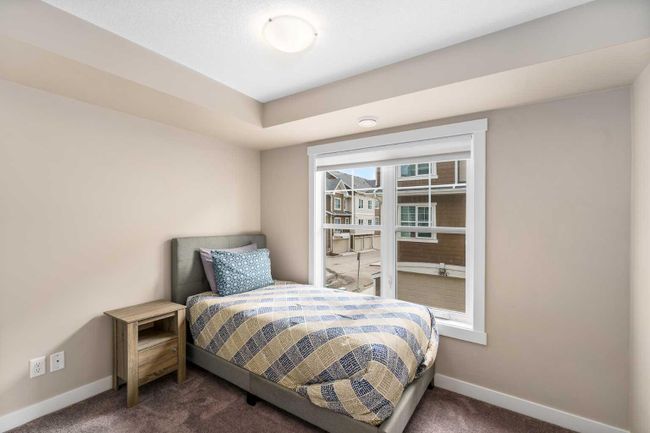 907 Cranbrook Walk Se, Home with 2 bedrooms, 1 bathrooms and 2 parking in Calgary AB | Image 14