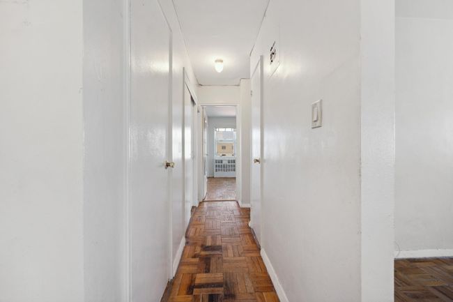 Hallway featuring baseboards | Image 9
