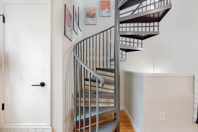 Staircase with wood finished floors and baseboards | Image 17
