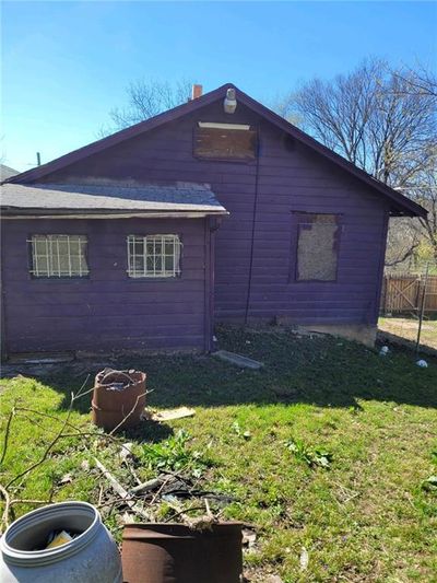 View of home's exterior with a lawn | Image 2