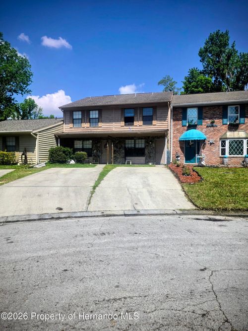 822 Village Dr, Brooksville, FL, 34601-3120 | Card Image
