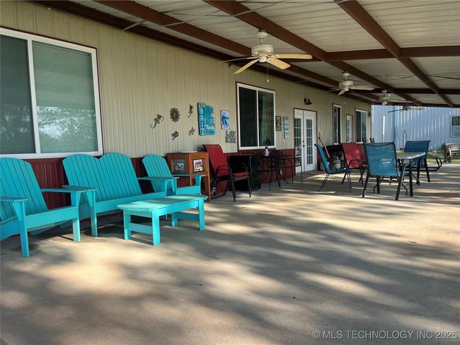 Back patio full length of house overlooking the lakefront | Image 27
