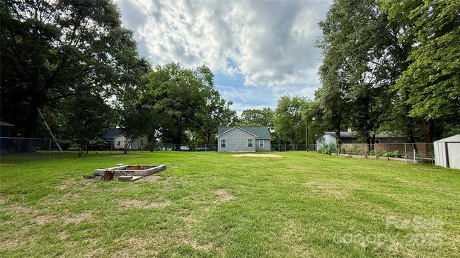Rear of house from the yard. | Image 32
