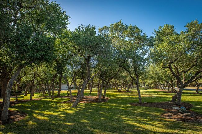 View of home's community featuring a lawn | Image 5