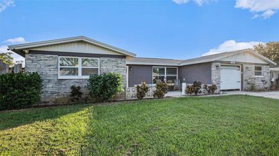 3706 Bigelow Drive, House other with 3 bedrooms, 2 bathrooms and null parking in Holiday FL | Image 3