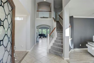 GORGEOUS TWO-STORY ENTRY WAY GREETS YOU AS YOU ENTER THE HOME. | Image 3