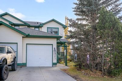 228 Quigley Close, Home with 3 bedrooms, 2 bathrooms and 2 parking in Cochrane AB | Image 1