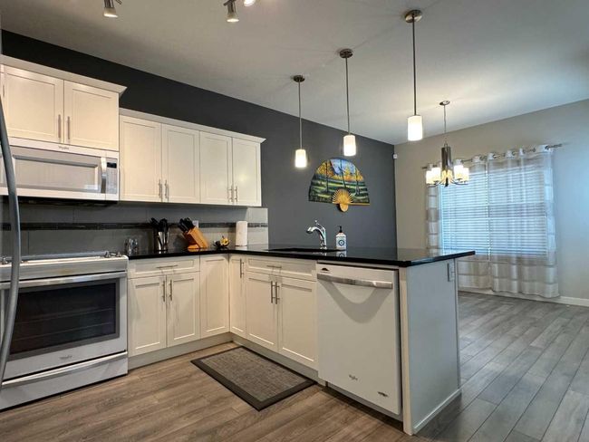 70 Moonlight Boulevard W, Home with 4 bedrooms, 3 bathrooms and 4 parking in Lethbridge AB | Image 15