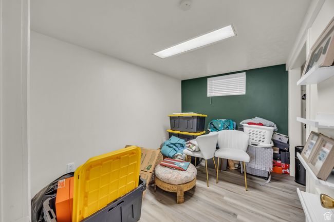 Bedroom with wood finished floors | Image 24